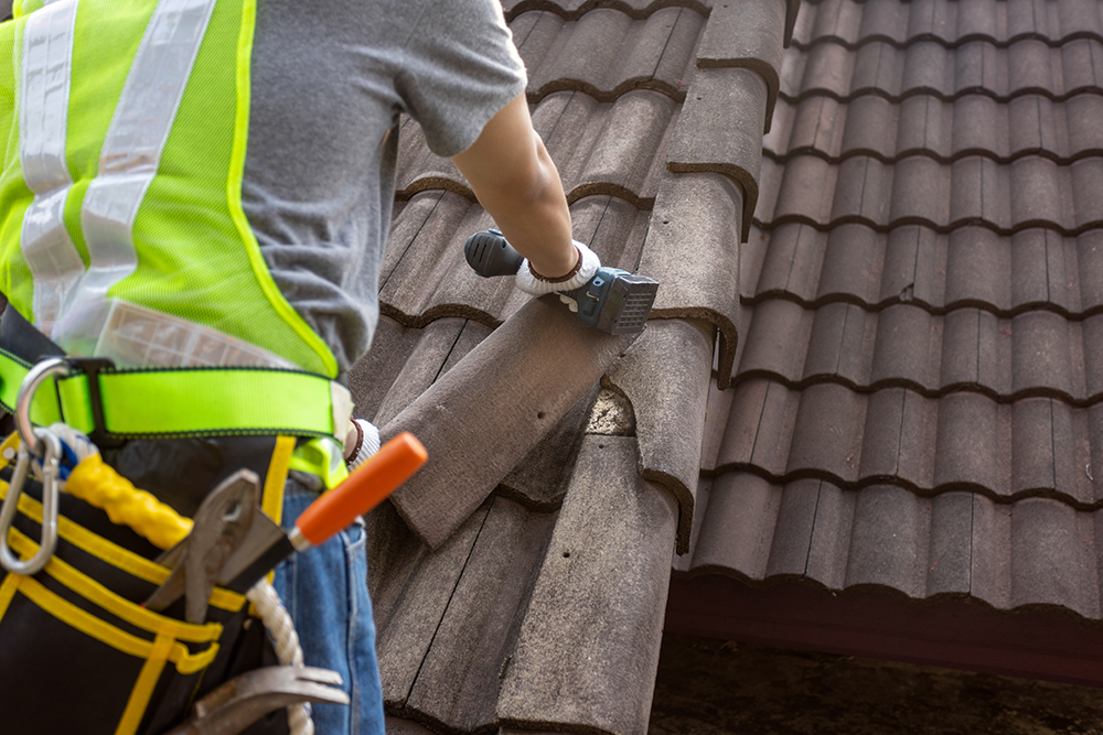 Pitch Perfect Roofing staff repairing roof in Glendale Arizona